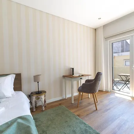 9 Quartos Hotel Avelar