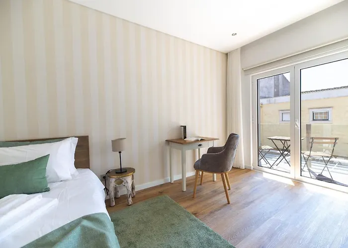 9 Quartos Hotel Avelar